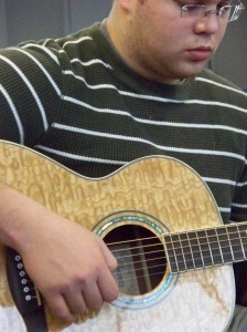 Young man plays christmas songs